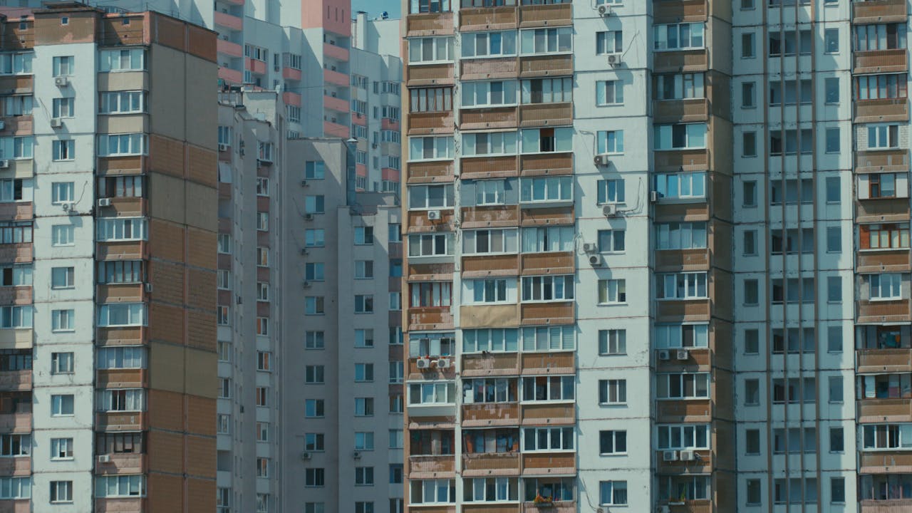 about-us Urban high rise apartment buildings in Kyiv, Ukraine, showcasing unique architectural styles.